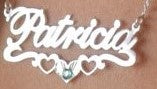 a Name Necklace with the name "Patricia" on the neck of a model